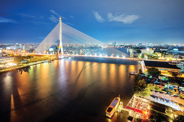 Rama-VIII-Bridge-at-night-in-Bangkok-and-Chopraya-river,-Thailand-copy